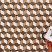 baldosas en forma de rombo en tres tonalidades que generan la ilusión óptica de un suelo en relieve