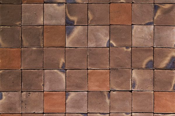 Close up of a terracotta floor made of slate tiles