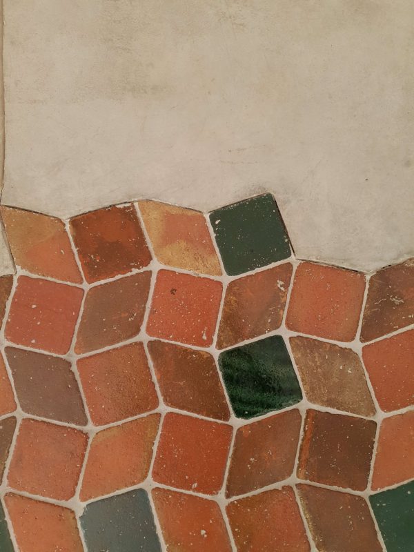 Close up of the galzed terracotta pavement used in this project