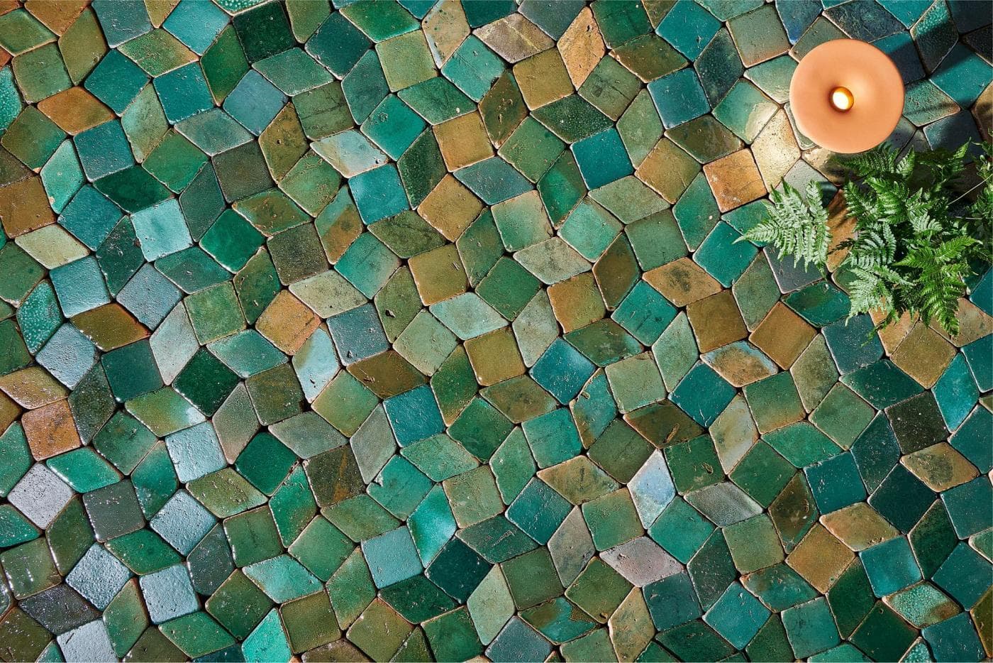 An ensemble of green glazed ceramic tiles